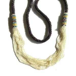 Elegant Beaded Necklace with Cream and Black Accents